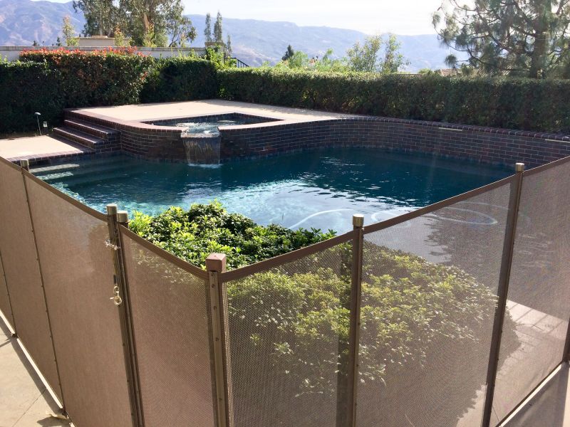 Mesh Pool Fence in Backyard